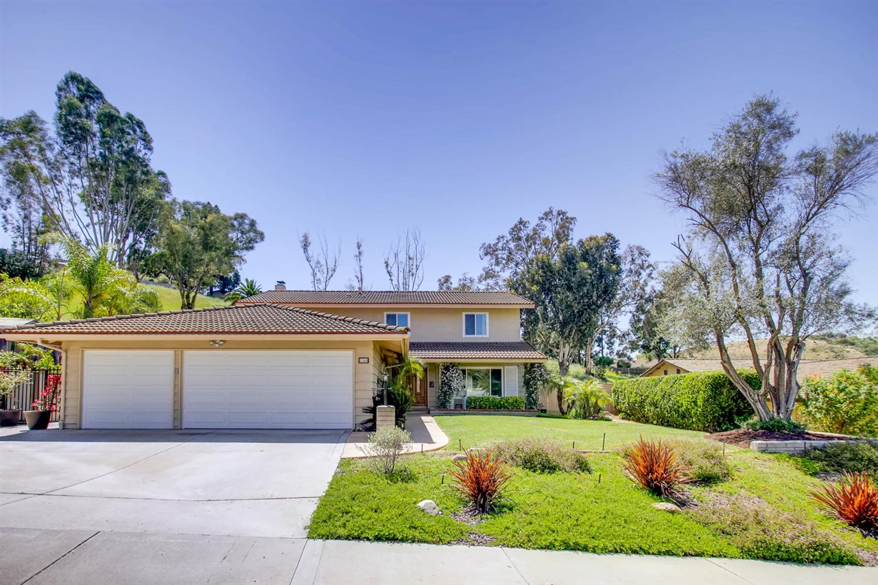 2345 Valley Mill Road El Cajon, CA 92020 - Photo 2 of 25 Exquisite landscaping fronts this beautiful home. Set in a tranquil natural area, you will feel outside of the city, while still being close everything you need.