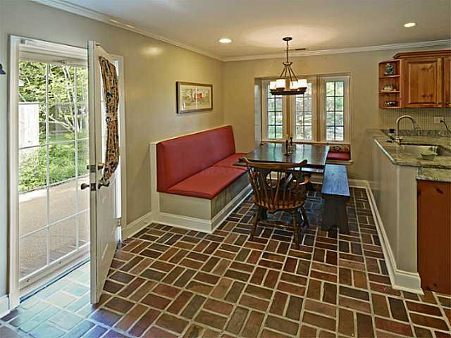 259 Ridgefield Road Memphis, TN 38111 - Photo 8 of 25 Fantastic breakfast area with built-in seating with storage. This side entry leads to the covered parking.