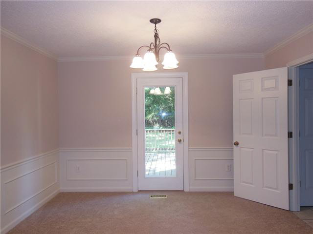 238 East Harpers Ferry Road Collierville, TN 38017 - Photo 4 of 17 Dining Room Has New Lighting, Library Crown Molding and Door Access to Large Deck!