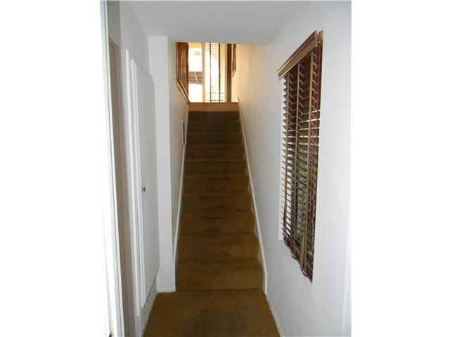 2355 Caringa Way, Unit 4 Carlsbad, CA 92009 - Photo 12 of 25 Stairs leading to enty from master bedroom.