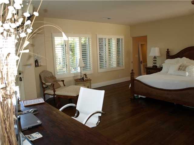 1378 Crest Drive Encinitas, CA 92024 - Photo 4 of 16 Master bedroom with ocean views, plantation shutters, Hickory hardwood flooring and his and hers master baths.