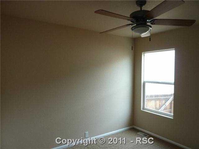 12337 Crystal Downs Road Peyton, CO 80831 - Photo 10 of 13 2nd bedroom