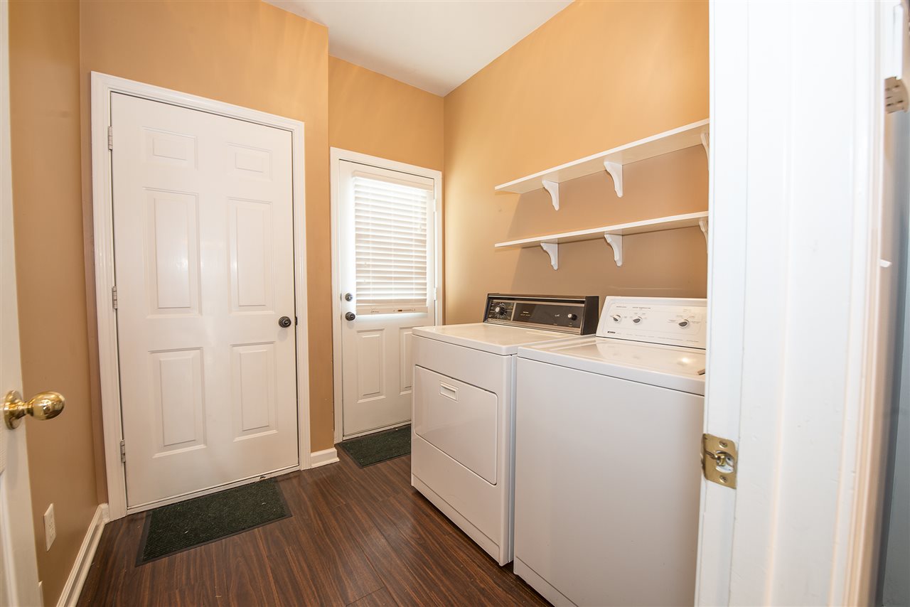 1237 Misty Isle Drive Memphis, TN 38103 - Photo 14 of 22 The laundry room is located in the rear of the home and includes the washer and dryer.