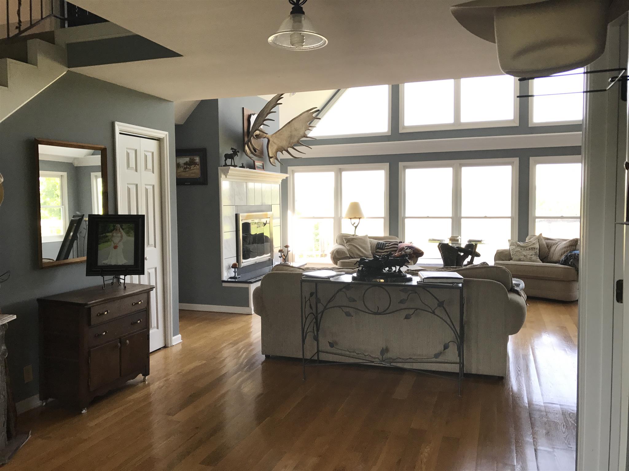348 Kelso-Smithland Road Kelso, TN 37348 - Photo 5 of 43 Step inside. The foyer welcomes you and invites you to appreciate the view from the floor to ceiling windows.