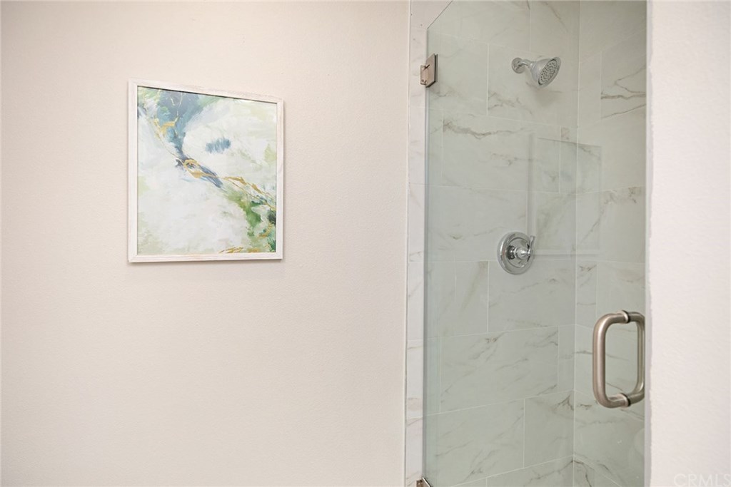 1745 North Bates Circle Anaheim, CA 92806 - Photo 17 of 32 Frameless glass shower with Calcutta style tile