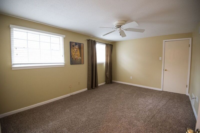 2405 Ridgeway Road Memphis, TN 38119 - Photo 21 of 25 This room is huge and is located upstairs with the other bedroom located on the other side of full bathroom upstairs. New Carpet just installed.