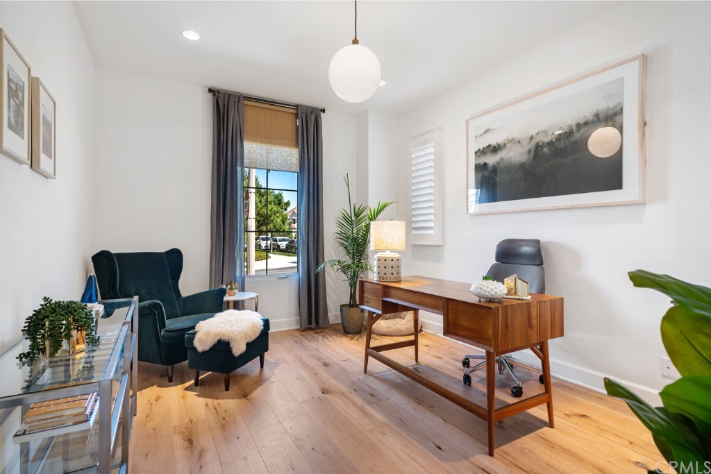 116 Mosswood Irvine, CA 92620 - Photo 15 of 42 The downstairs bedroom is being used as a tranquil workspace. It is also perfect for a guest bedroom since there is a full bath downstairs as well. This room also features a sliding door closet.