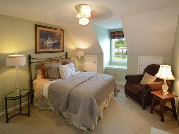4110 Minden Road Memphis, TN 38117 - Photo 18 of 25 Bedroom 3 is an inviting and cozy retreat with built-in window seat, additional under eave storage and a special nook with built-in book shelves. It has a huge walk-in closet and access to the walk-in attic through the closet.