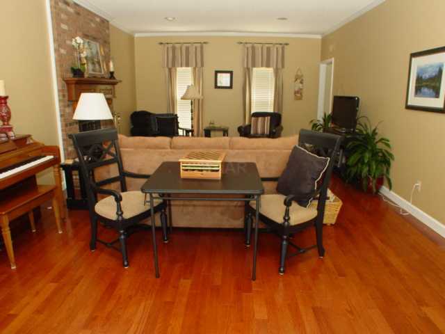 8516 Dulwich Road Memphis, TN 38016 - Photo 4 of 20 This is looking from the back to the front in the greatroom. Other arrangements have been to make this end the formal dining room and use the formal dining room as a playroom. Notice the pretty new hardwood.
