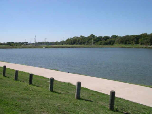 616 Phillips Drive Coppell, TX 75019 - Photo 1 of 1 Beautiful lake view from the back of the home.