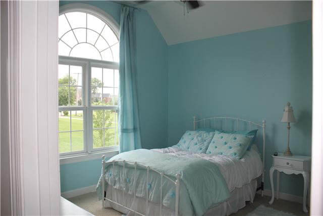 234 Ridgewater Way Mount Juliet, TN 37122 - Photo 24 of 30 All upstairs bedrooms have vaulted ceilings, large crescent windows, and ceiling fans. This bedroom has a private full bathroom.