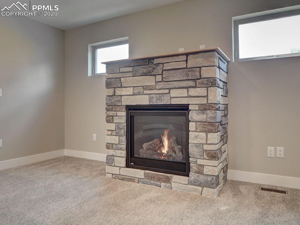 208 Custer Avenue Colorado Springs, CO 80903 - Photo 26 of 36 Gas insert fireplace on upper level