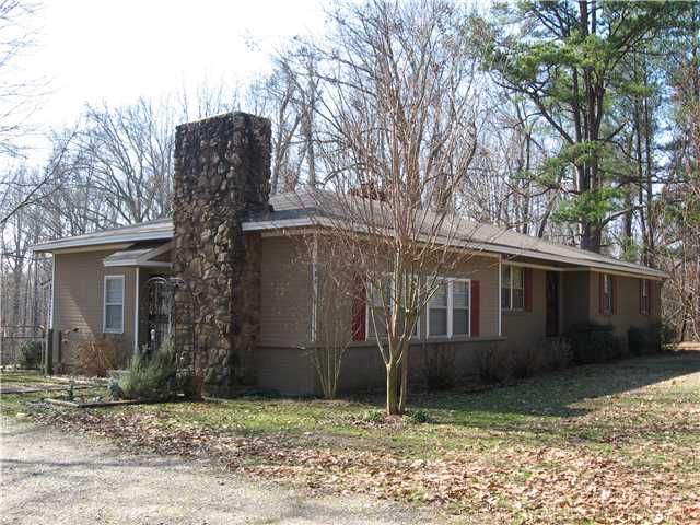 935 Fite Road Millington, TN 38053 - Photo 1 of 25 View from circular drive. 3BR/2BA + bonus rm + sunroom (added 2006). Pretty painted brick, new roof 2012 &new central heat/air 2010. This entry opens into the BIG great room w/oversized stone fireplace.