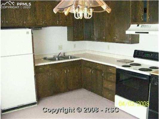4615 Mallow Road Colorado Springs, CO 80907 - Photo 2 of 3 Kitchen with Refrigerator Included