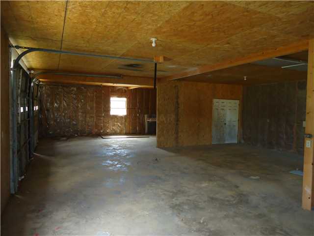 795 Portersville Road Atoka, TN 38004 - Photo 11 of 12 Detached garage with storage area.