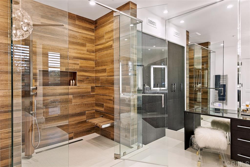 6221 Mimulus Rancho Santa Fe, CA 92067 - Photo 21 of 25 Heated stone floors, hidden washer & dyer for master only, doors out to private spa garden...