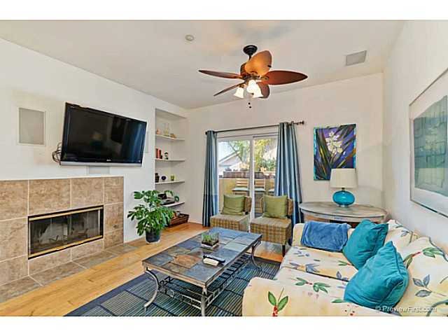 366 Forward Street, Unit E La Jolla, CA 92037 - Photo 5 of 23 Fireplace in Living Room with surround sound and balcony