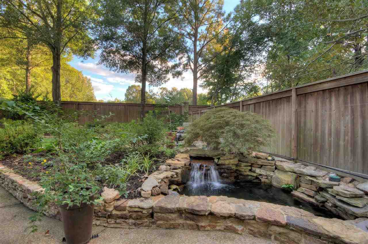 1277 South Dubray Place Collierville, TN 38017 - Photo 20 of 25 Stacked stone surrounds the medicinal and soothing water feature