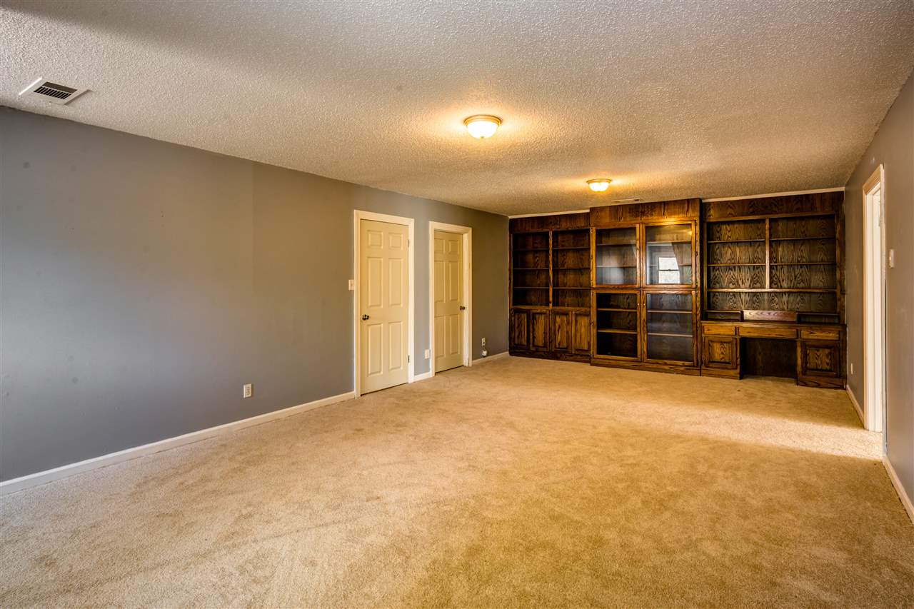 5960 Walsh Road Millington, TN 38053 - Photo 17 of 25 Upstairs With Built In Shelves, Carpet and Shared Bathroom.