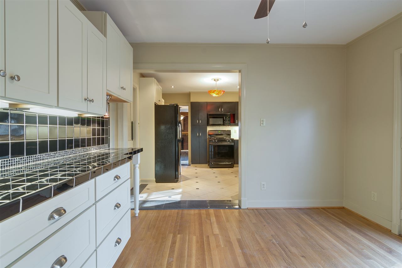 169 South Mendenhall Road Memphis, TN 38117 - Photo 13 of 23 Buffet area with cabinets and totally refinished solid oak hardwood floors