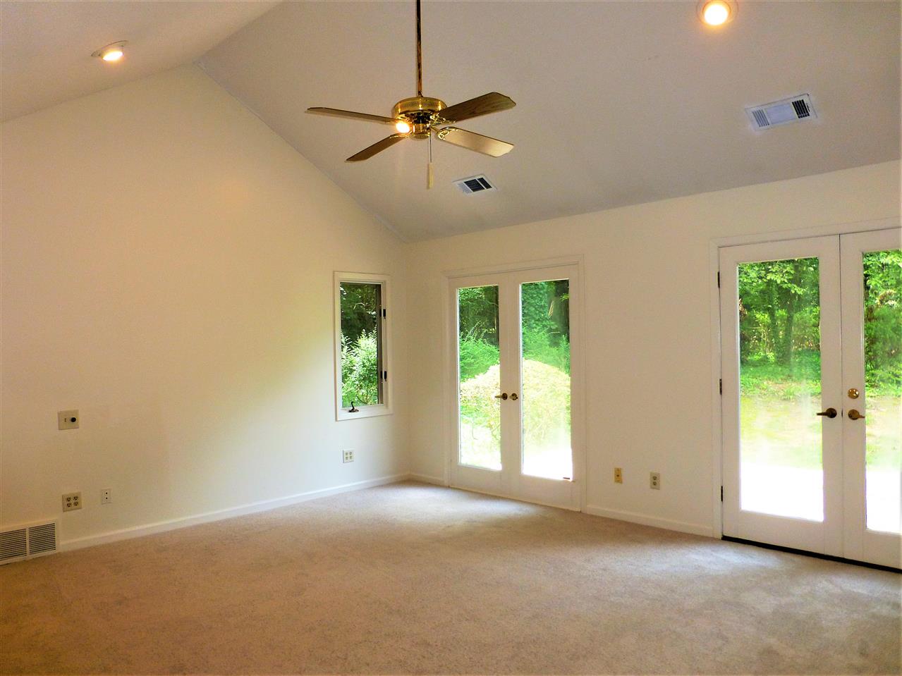 1105 Blake Road Memphis, TN 38018 - Photo 8 of 25 Large vaulted downstairs master with French doors out to the deck.