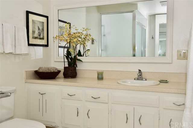 13881 Thunderbird Drive, Unit 64K Seal Beach, CA 90740 - Photo 19 of 21 Full view of sink and vanity.