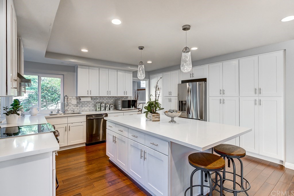 1000 Shadow Canyon Road Brea, CA 92821 - Photo 3 of 32 Shaker style cabinetry includes four pantrys, two with pull out drawers!