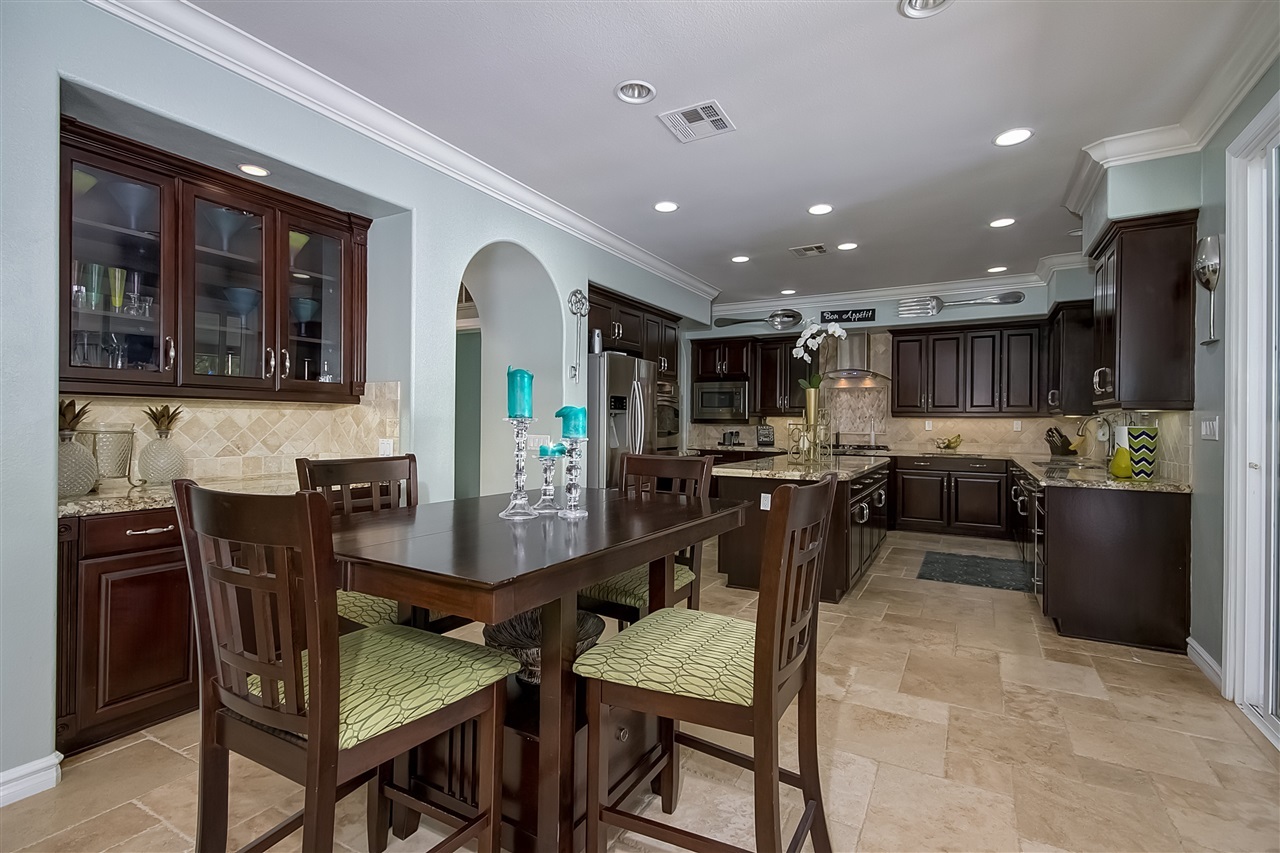 1853 Shadetree Drive San Marcos, CA 92078 - Photo 9 of 25 Breakfast area with Built in Bar with Granite counter