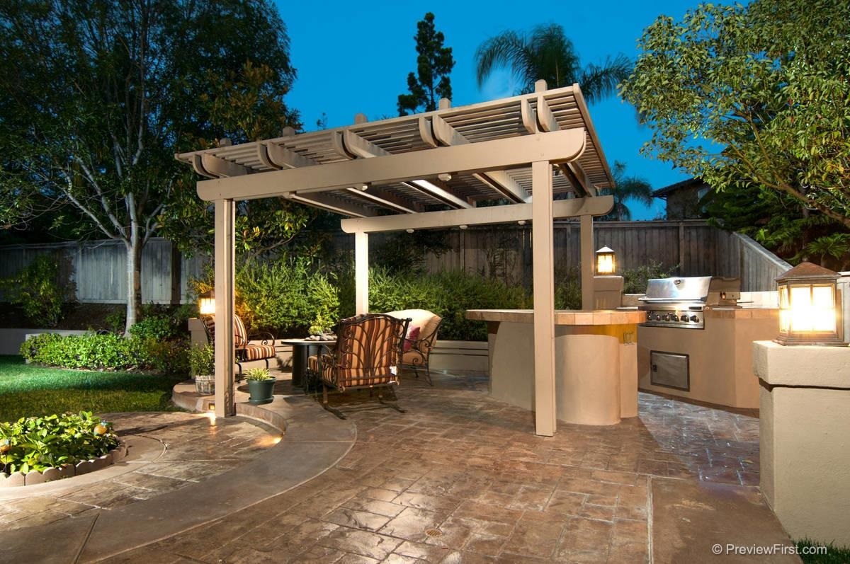 16325 Deer Ridge Road San Diego, CA 92127 - Photo 24 of 25 Charming space highlighted with night coach lighting, surrounded by the privacy of Trees and plants.