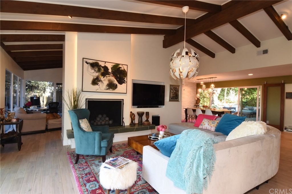 12 Harbor Sight Drive Rolling Hills Estates, CA 90274 - Photo 11 of 56 Living room is so inviting with gorgeous flooring, beamed ceilings, pretty fireplace with hearth, and built in TV nook!