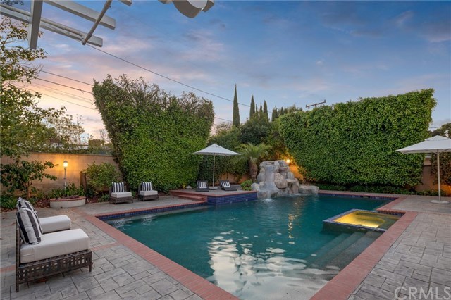 1437 La Perla Avenue Long Beach, CA 90815 - Photo 40 of 43 Sit and relax in your salt water pool and jacuzzi.