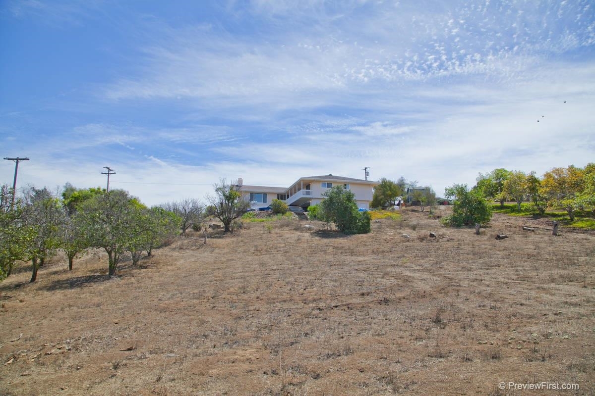 4933 Conejo Road Fallbrook, CA 92028 - Photo 25 of 25 Looking towards the house from the far end of the parcel. Notice how usable the land is. There are no CC&Rs so you can bring your horses, chickens, etc.