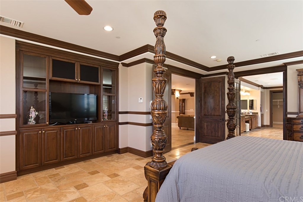 1640 Hillside Avenue Norco, CA 92860 - Photo 41 of 75 Main master bedroom with built in cabinetry and French doors to master bathroom
