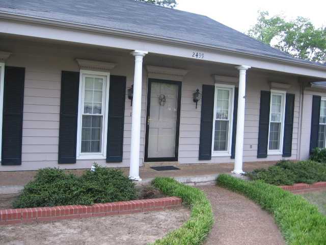 Welcome to  this one story brick home with a covered front porch and new, thermapane windows all around the house.