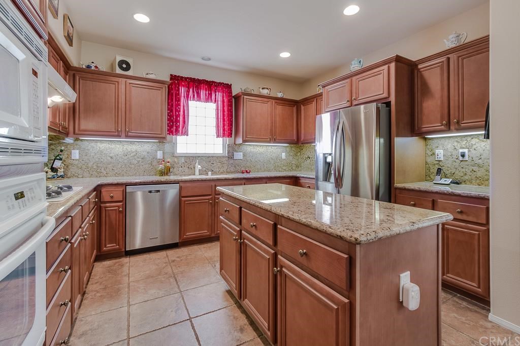 221 Sklar Street Ladera Ranch, CA 92694 - Photo 1 of 1 You will love cooking in your open and spacious kitchen with large center island and granite counters.