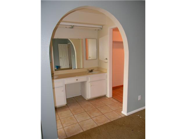 2355 Caringa Way, Unit 4 Carlsbad, CA 92009 - Photo 15 of 25 Vanity area for master bedroom.