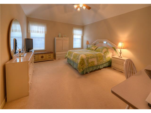 1371 River Ridge Drive Collierville, TN 38017 - Photo 11 of 25 The master bedroom, with its coffered ceiling and soothing colors, offers a retreat into relaxation after those long days at work. Can't you just imagine yourself getting a good night's sleep in this beautiful room?