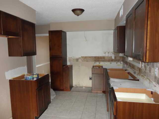 5737 Foxdale Road Memphis, TN 38115 - Photo 11 of 24 Kitchen is in Process.. All new cabinets and counter tops .. tile backsplash .. tile floor ..