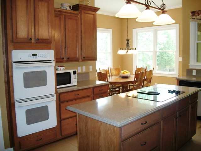 1270 Cherry Road Eads, TN 38028 - Photo 7 of 12 Terrific center island with solid surface counters makes cooking such a joy!