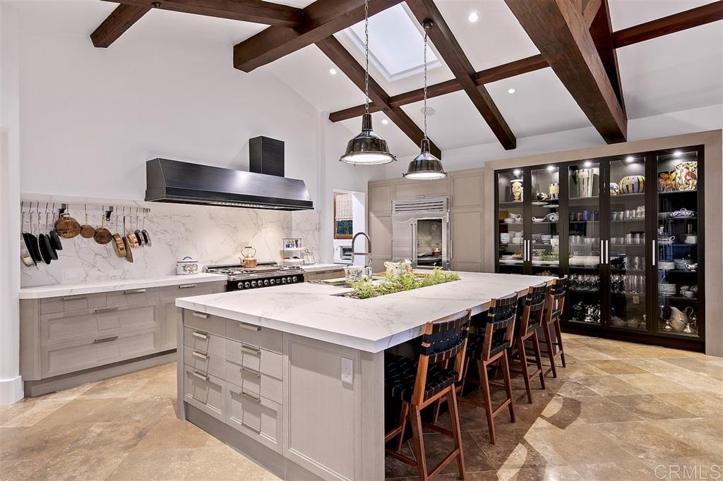 6221 Mimulus Rancho Santa Fe, CA 92067 - Photo 4 of 25 Custom designer kitchen and stunning walk-in pantry. Vintage lights from Paris. The latest high-end appliances Viking "Tuscany series". Very chic and timeless.