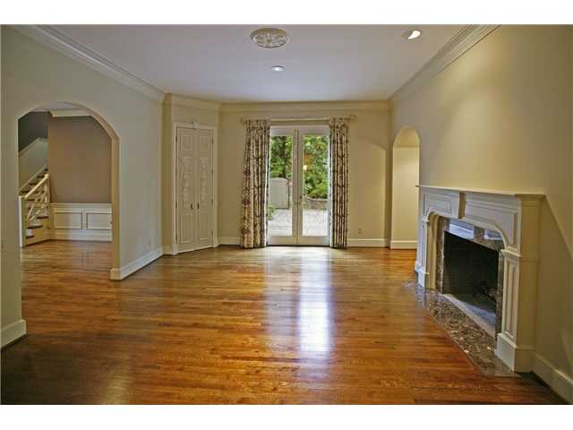 175 Waring Road Memphis, TN 38117 - Photo 5 of 12 Formal dining room with fireplace and china closets.