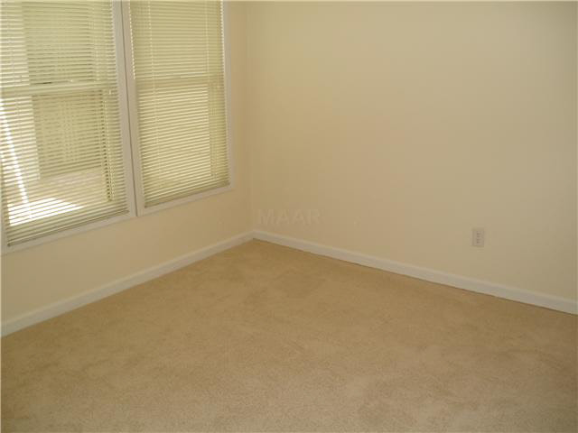 The master bedroom is located on the ground floor and has a walk-in closet.