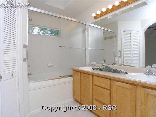 6635 Quarter Circle Road Colorado Springs, CO 80922 - Photo 7 of 10 Masher Bath With Soaking Tub & Double Vanity