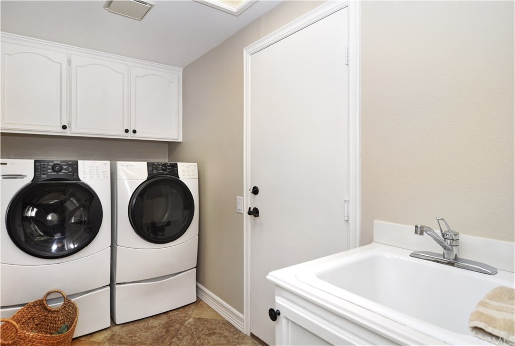 7 Estates Drive Villa Park, CA 92861 - Photo 29 of 46 Laundry room with linen closet and sink.