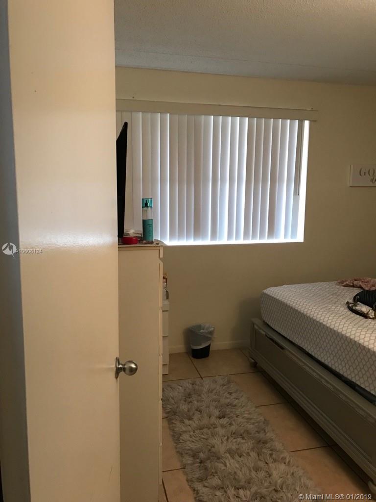 6065 Northwest 186th Street, Unit 207 Hialeah, FL 33015 - Photo 2 of 8