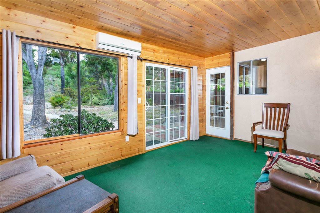 1387 Peacock Boulevard Oceanside, CA 92056 - Photo 11 of 15 A fully finished bonus room with insulation, heating and AC adds space to the home.