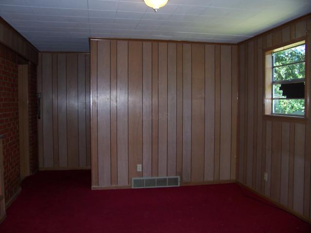 5484 Mesquite Road Memphis, TN 38120 - Photo 9 of 12 Back of the house features paneled den, large laundry room, and 1/2 bath.