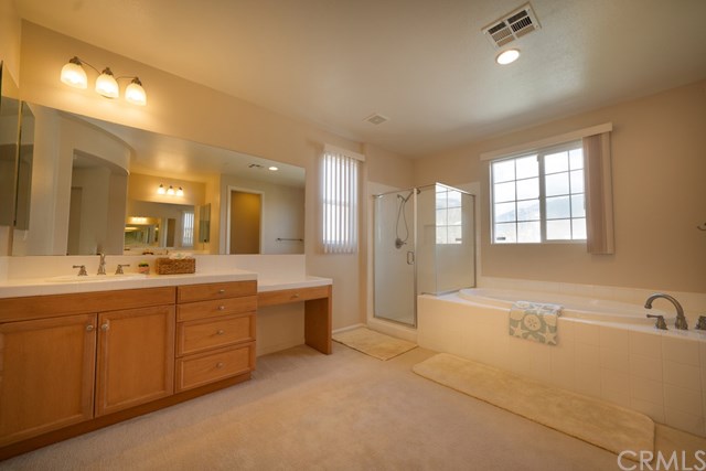 5473 Stoneview Road Rancho Cucamonga, CA 91739 - Photo 33 of 56 Master bath with large sunken tub and dual vanities