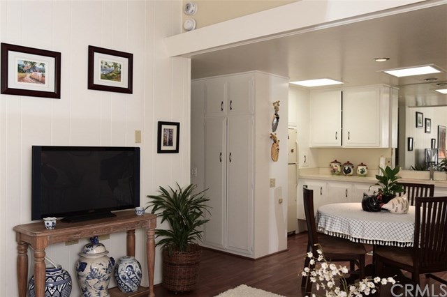 13881 Thunderbird Drive, Unit 64K Seal Beach, CA 90740 - Photo 6 of 21 View of partial kitchen with entrance to bathroom and bedroom.