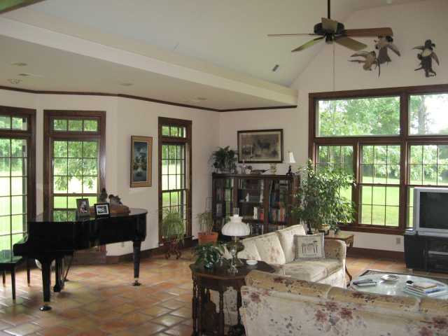 4545 Fleming Road Collierville, TN 38017 - Photo 5 of 12 Enjoy sweeping views of this outstanding property from the huge Den/Great Room accentuated by tall coffered ceilings, ceramic tile floor, and ventless gas fireplace.